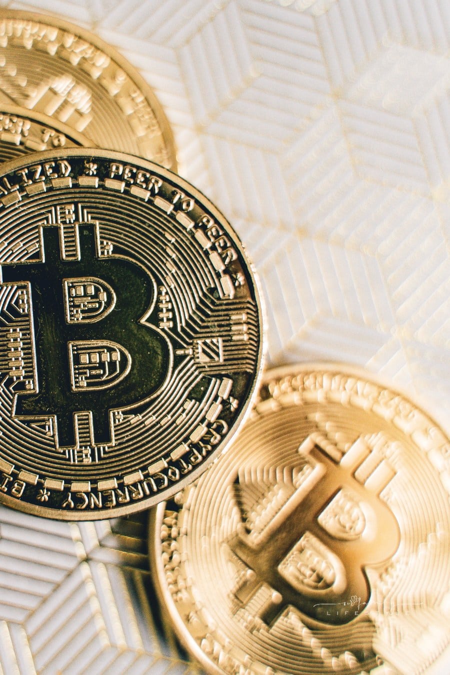 Close Up Photo of Four Bitcoins