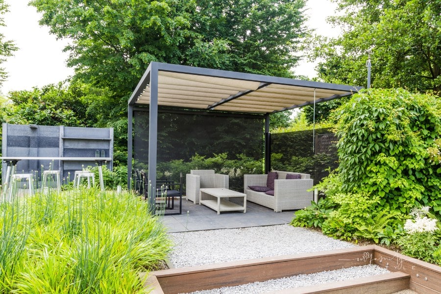 Garden Design with Metal Rooftop and Natural Stone Patio