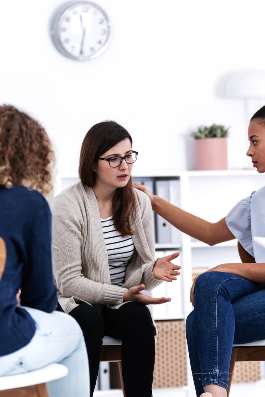 women supporting each other in a support group