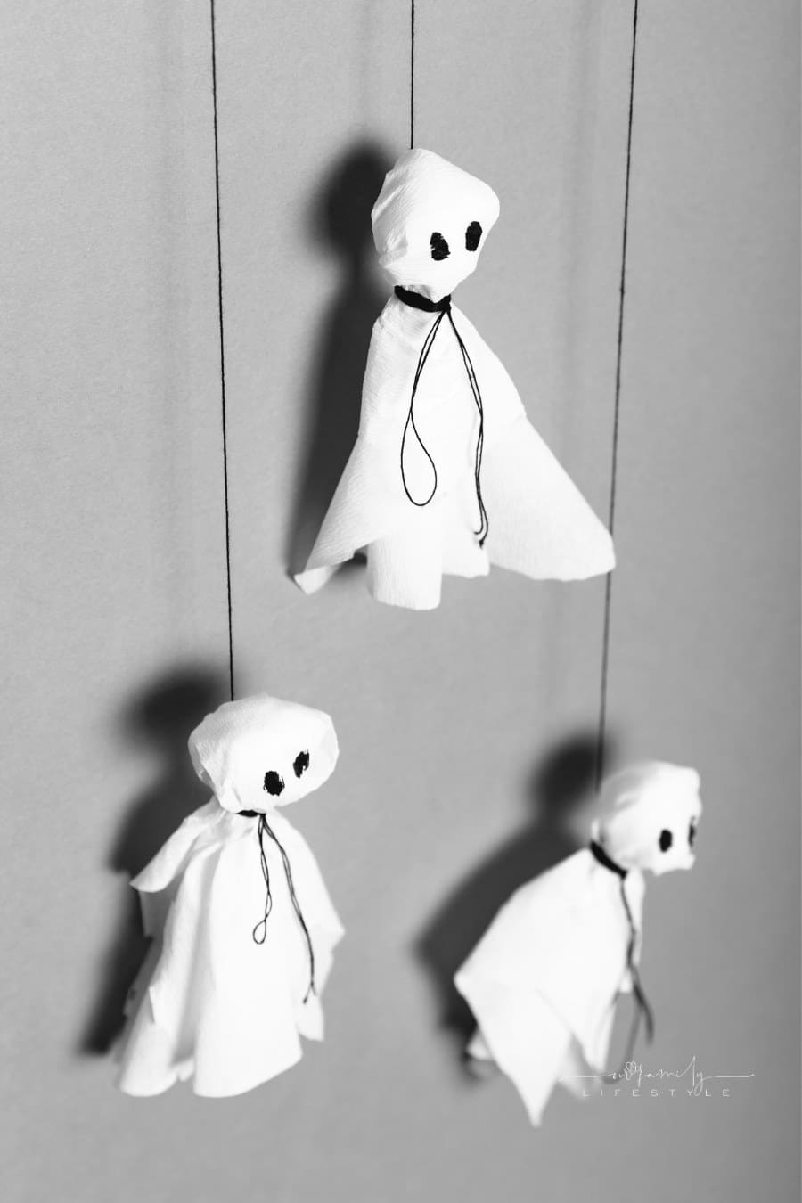 Tissue Paper ghosts art. Celebration Halloween craft concept