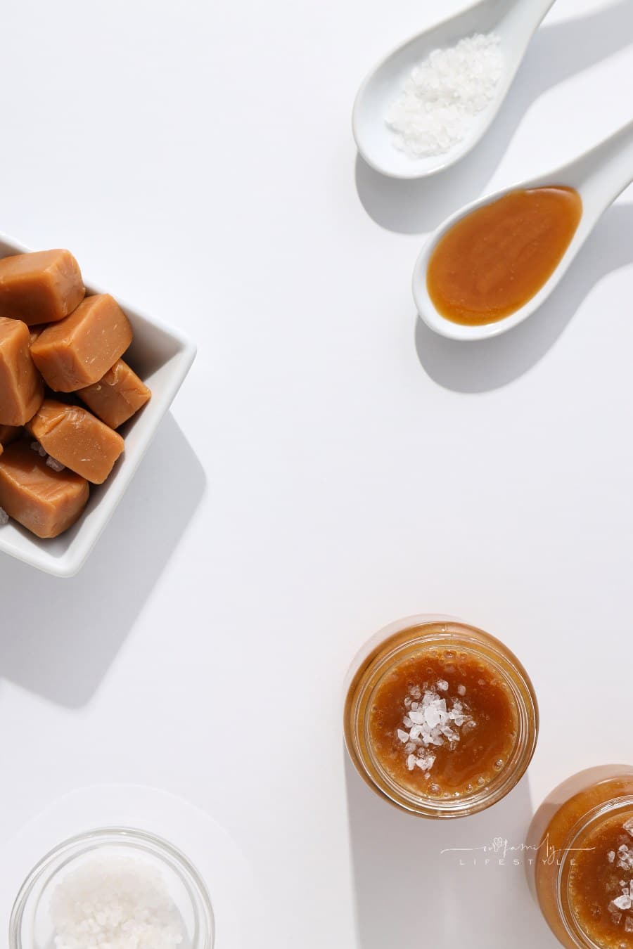 Cubes of salted caramel syrup with caramel in a jar