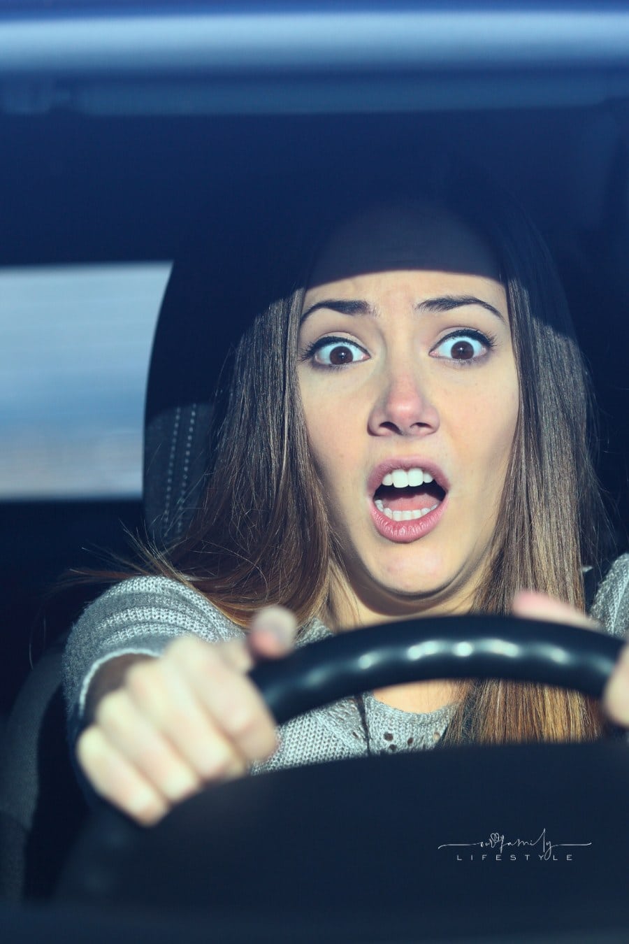 Scared driver driving a car before an accident