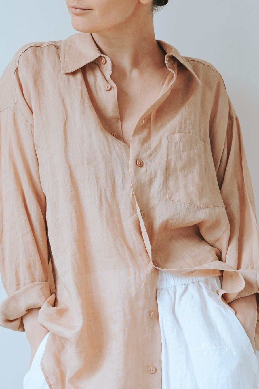 Woman in Neutral Linen Clothes