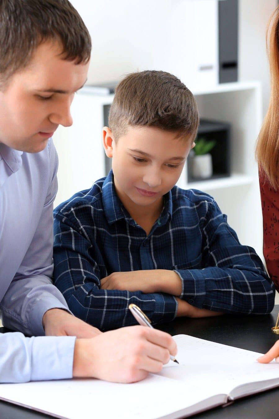 Divorced Parents with Their Son Visiting Lawyer. Concept of Child Support