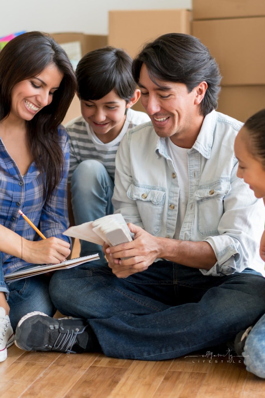 Family planning upcoming move with boxes packed in background