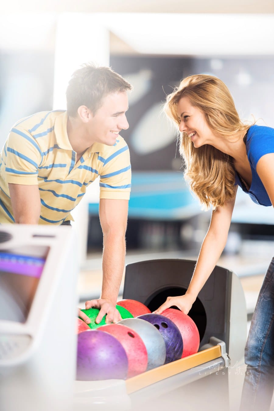 Couple at the bowling alley