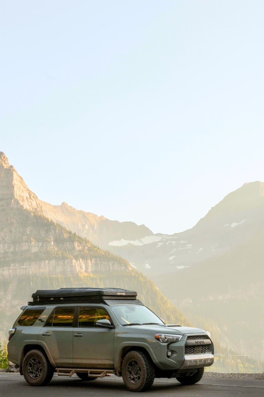 Mount Oberlin Looms Large Over Toyota 4Runner Along Going To The Sun Road