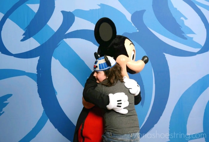 hugging Mickey Mouse at Walt Disney World