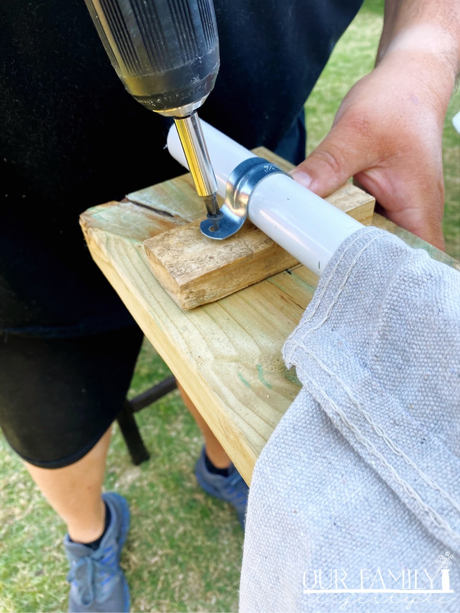 insert pipe into canvas rod pocket