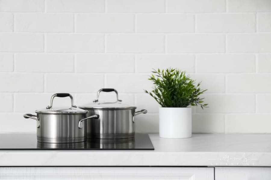 New Saucepots on Induction Stove in Kitchen