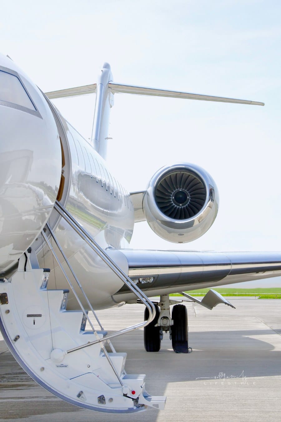 Stairs with jet engine on a private airplane - Bombardier