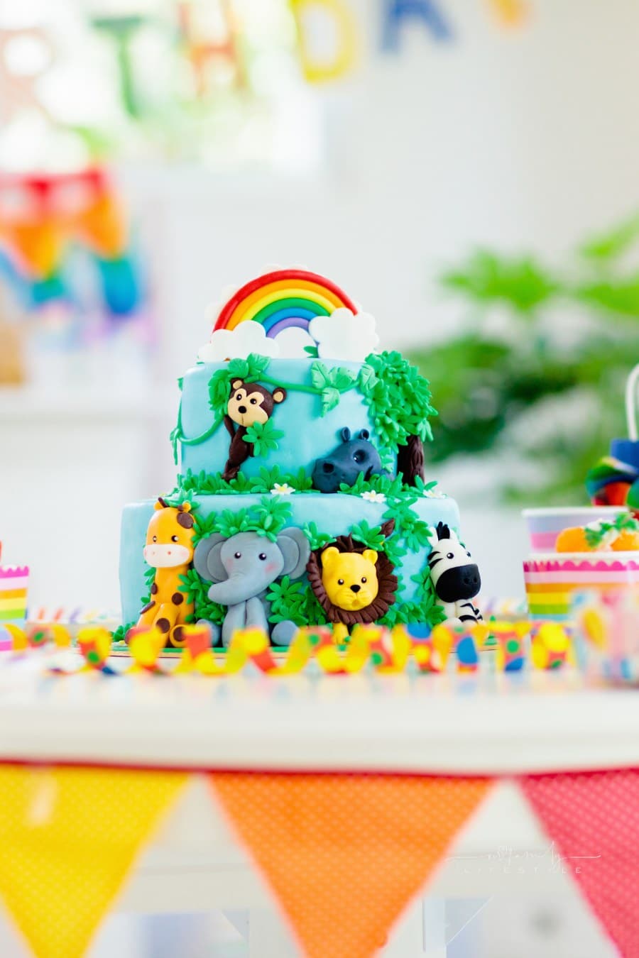 Kids birthday cake. Child jungle theme party.