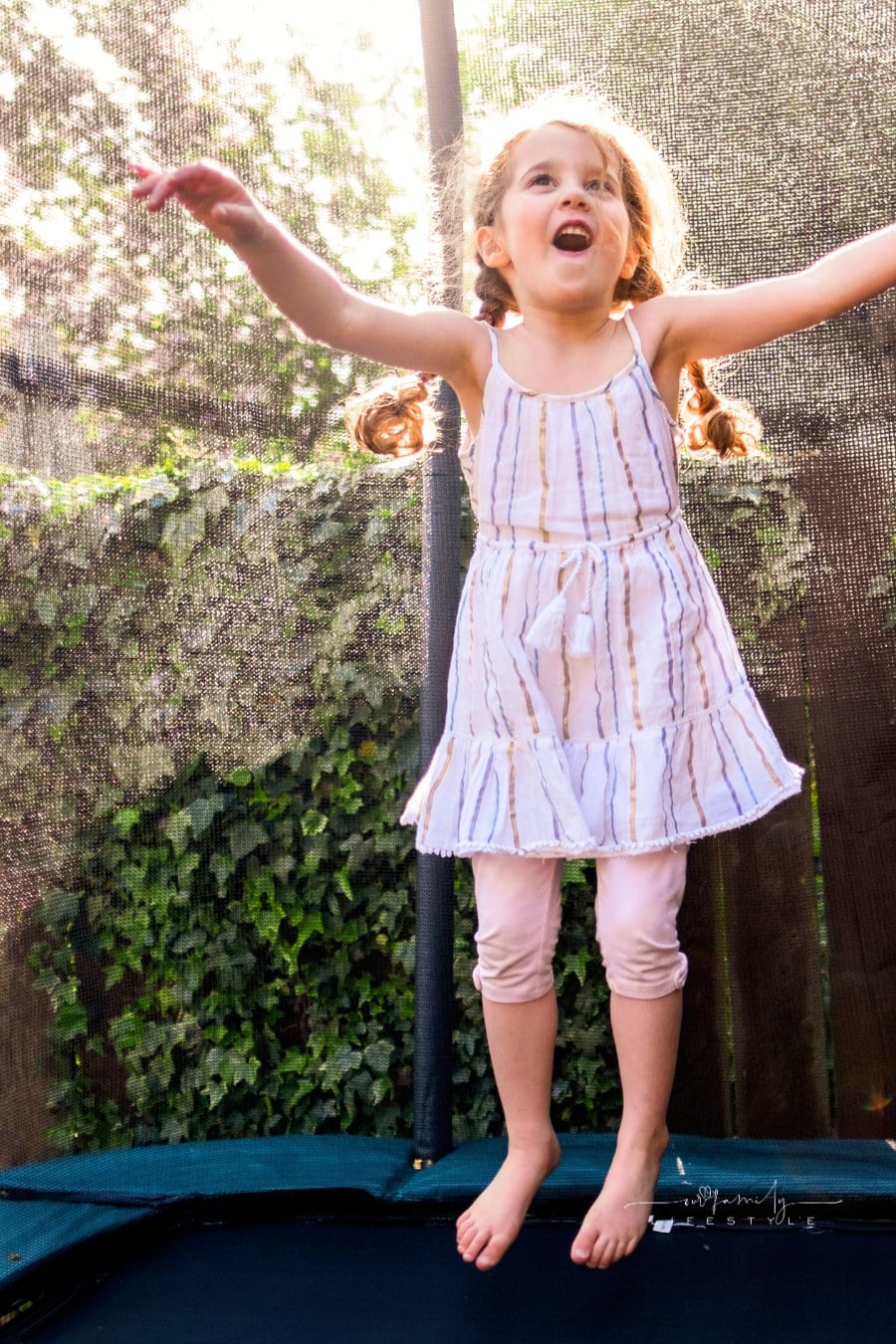 happy child jumping on a trampoline