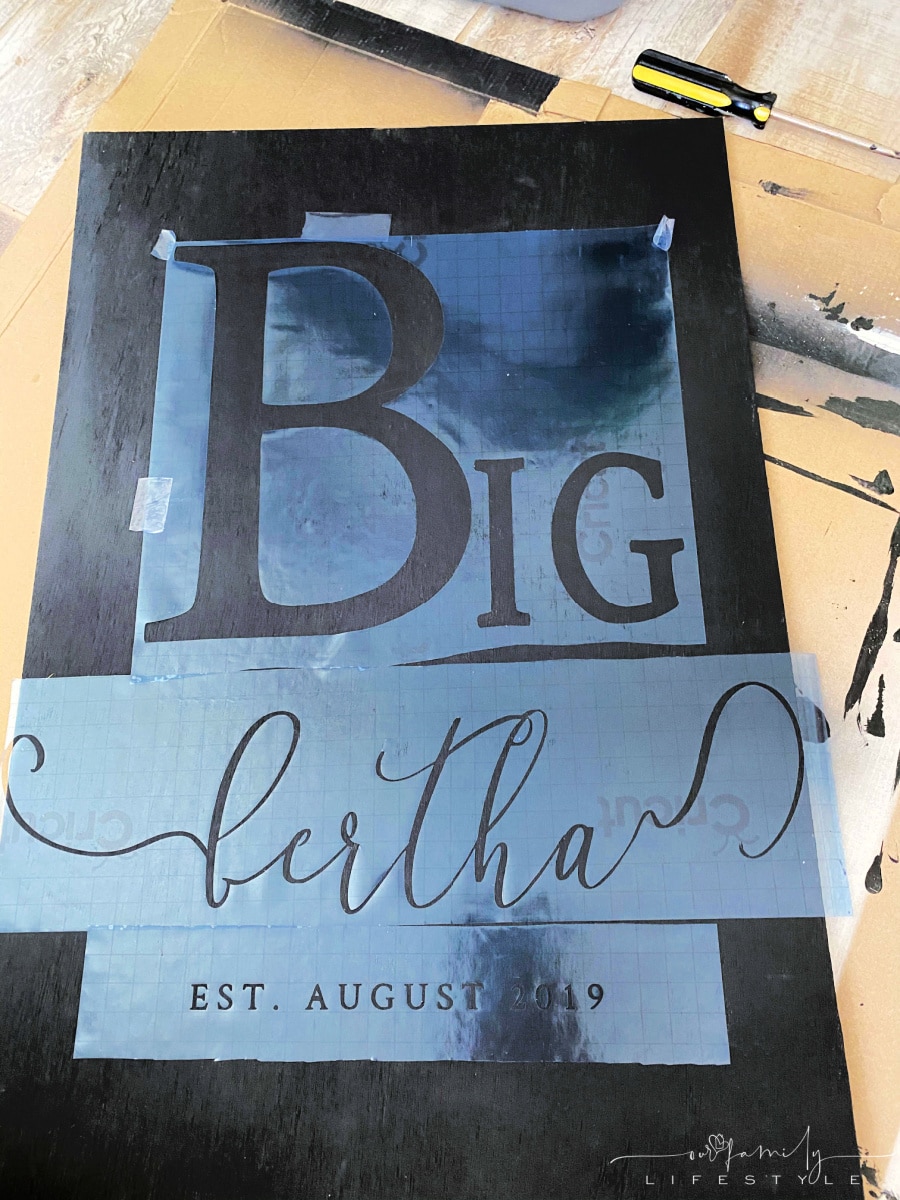 painting wooden sign using Cricut Stencil Vinyl