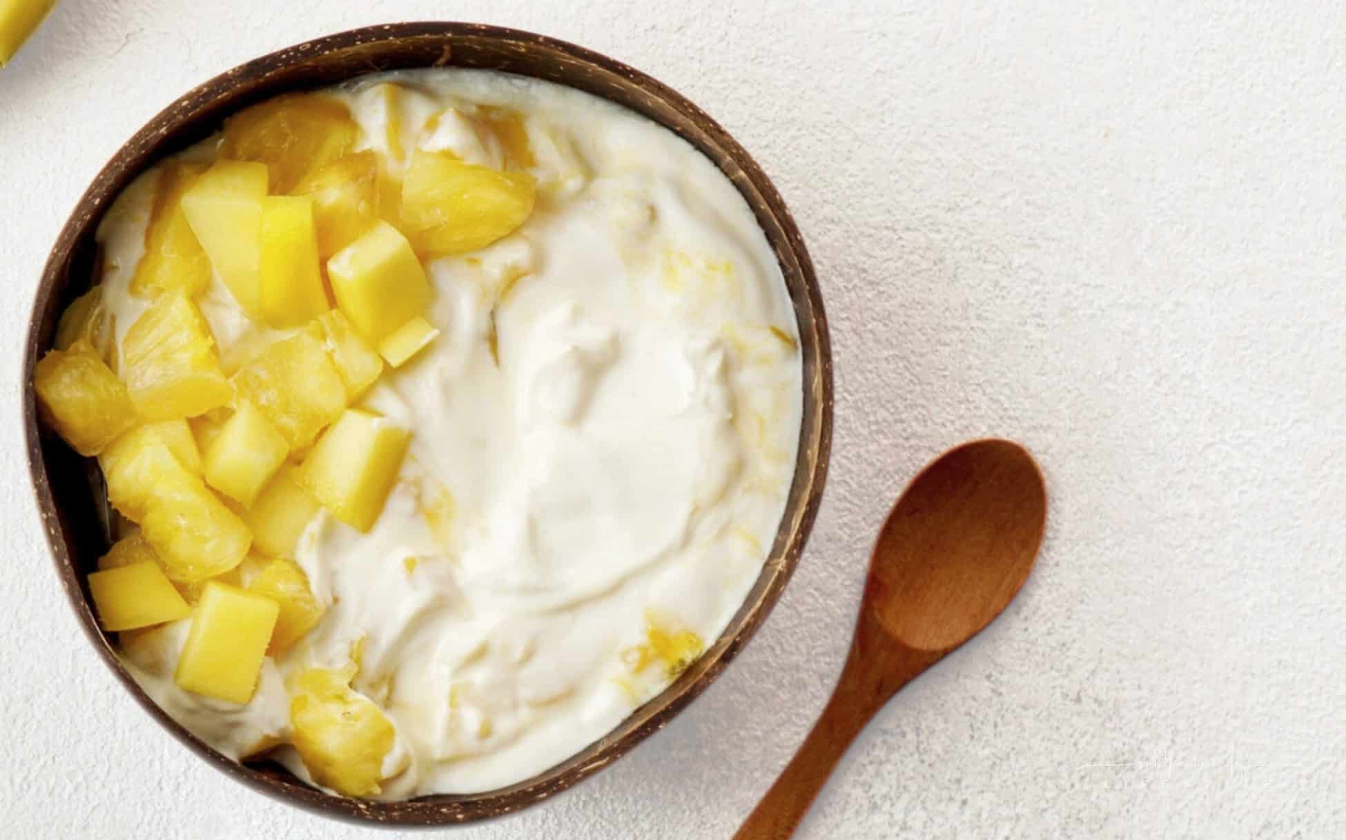 Pineapple Cream Cheese Dip in a brown bowl