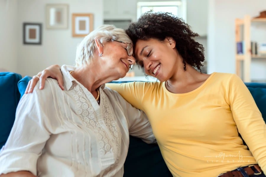 Smiling elderly woman and her daughter