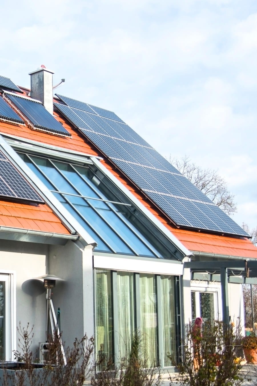 red roof of house with solar panels