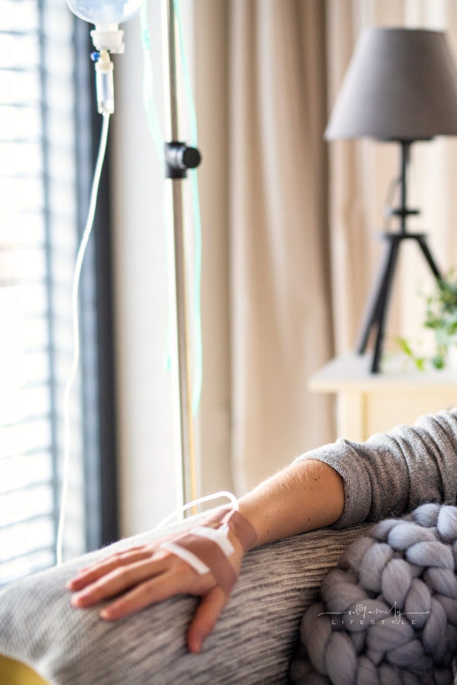 Pregnant Woman with an IV Drip at Home