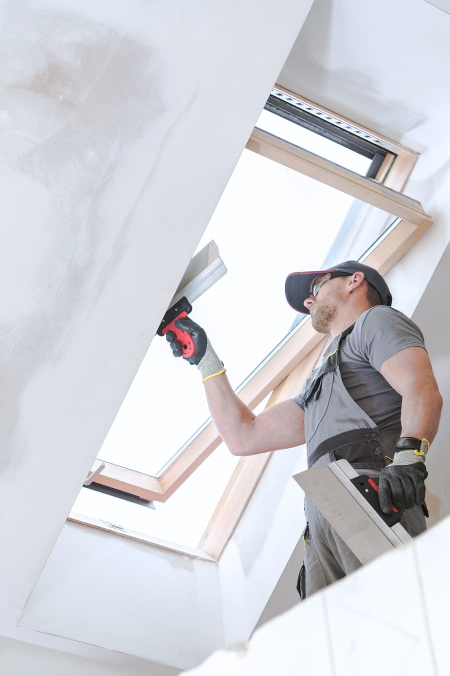 Man Remodeling Interior of House