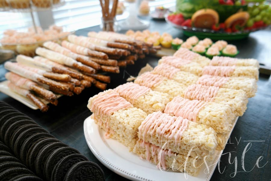 Rice Krispie treats and chocolate covered pretzel rods