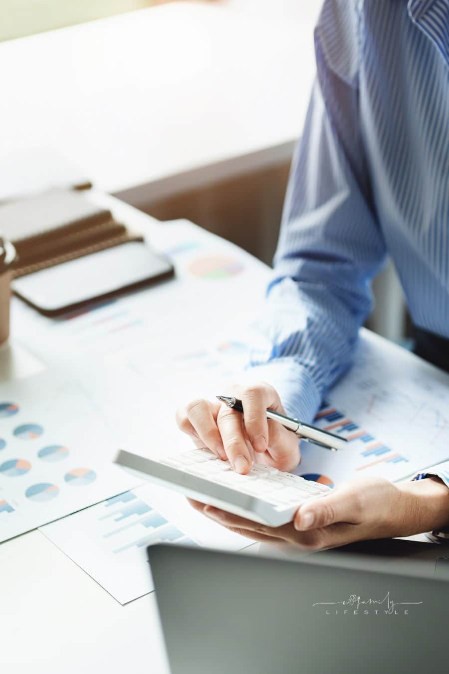 woman looking at investment calculator