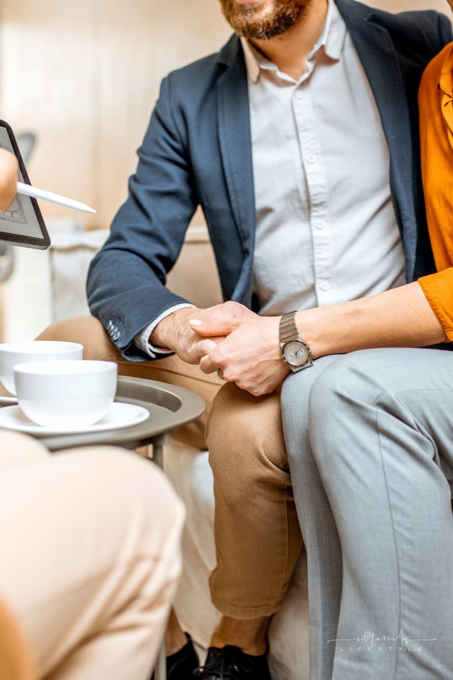 couple talking to real estate agent