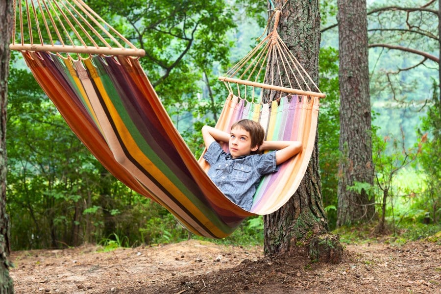 Child in hammock outdoors