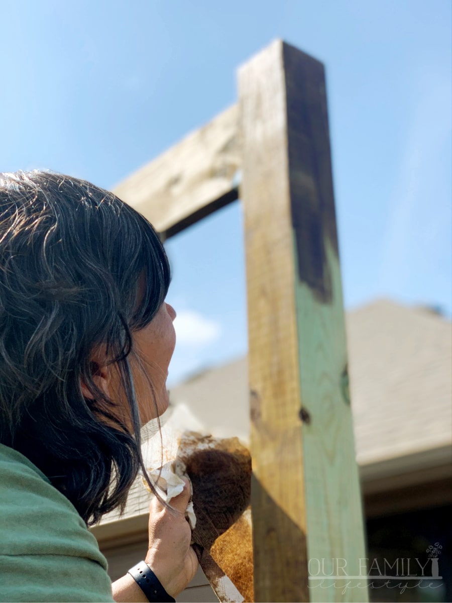 stain the poles and header