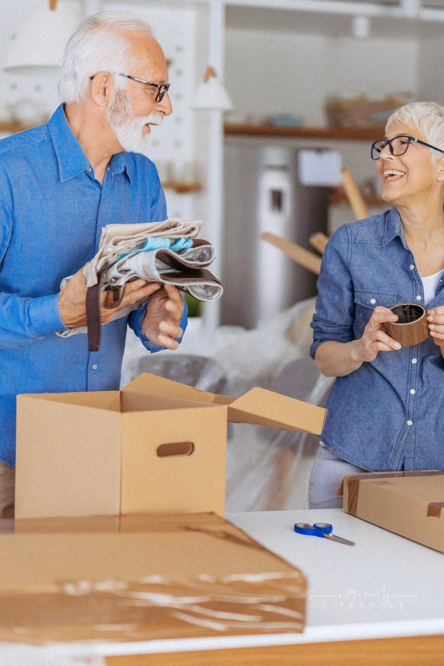 senior couple moving into new independent living home