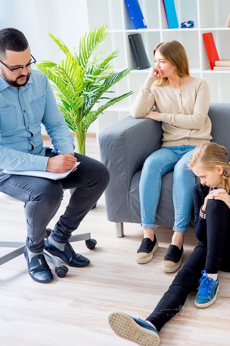 Teen daughter in family therapy