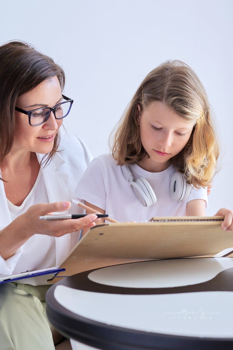 Family Social Worker Talking to a Child
