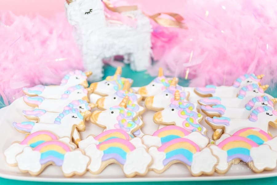 Unicorn sugar cookies decorated with royal icing at the kids birthday party.