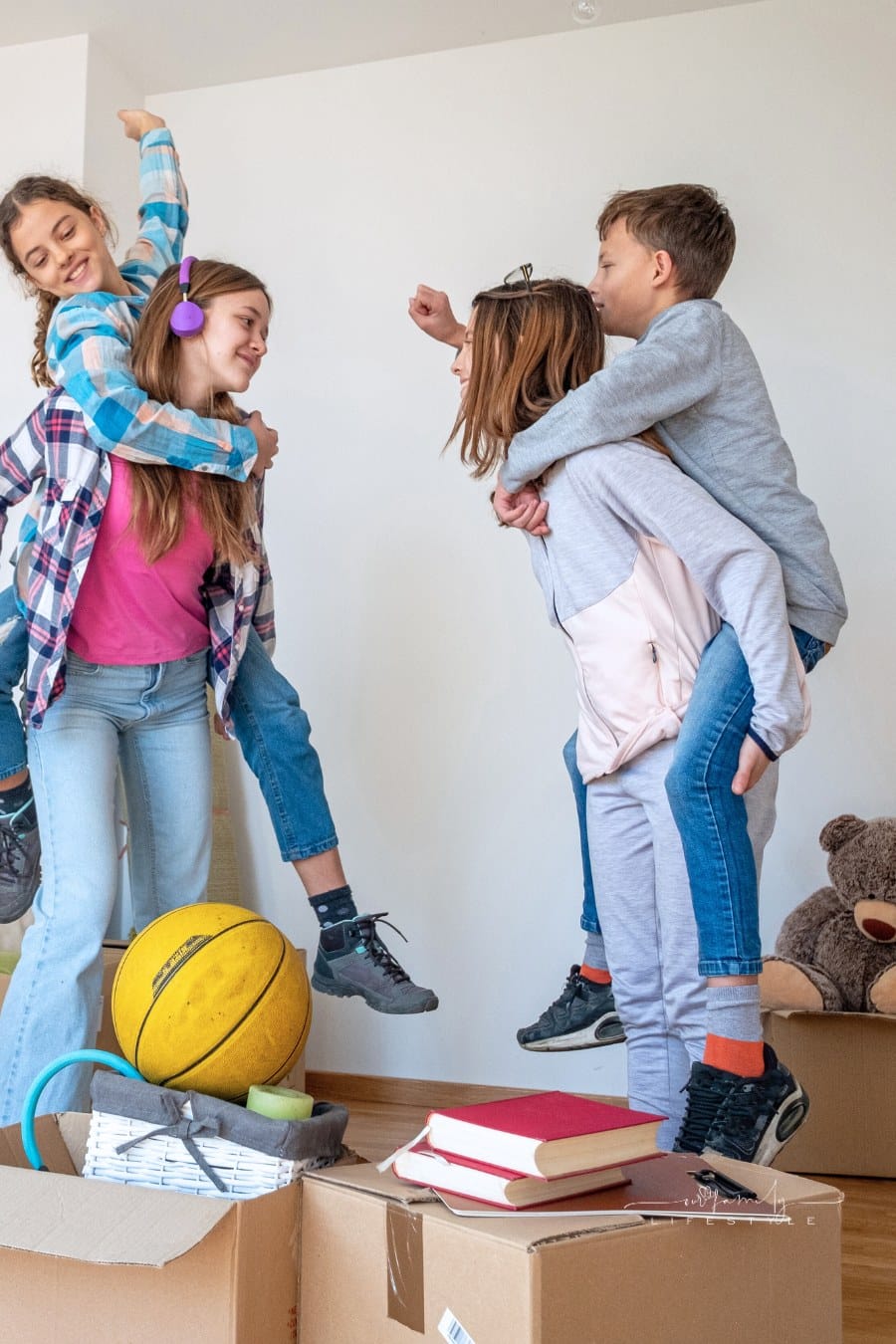 Teenagers on the move to a new home