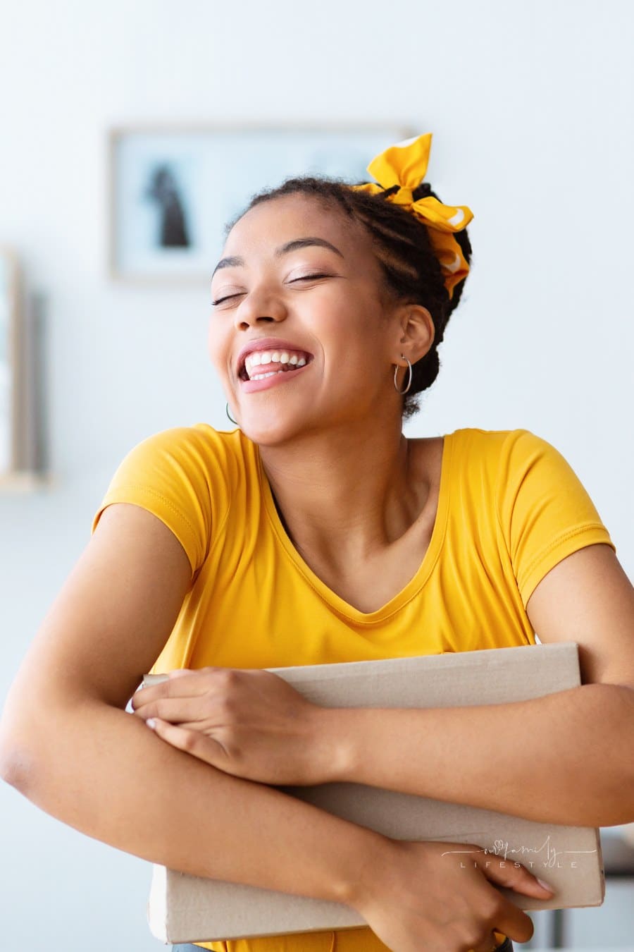Happy With Purchase. Portrait of smiling female buyer hugging carton cardboard box with present, received good parcel, satisfied with gift, lady embracing package at home