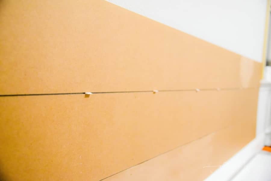 use tile spacers for diy shiplap wall