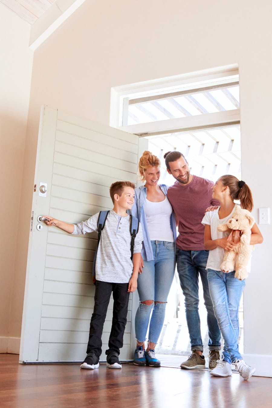 Family Opening Door and Walking into vacation rental house