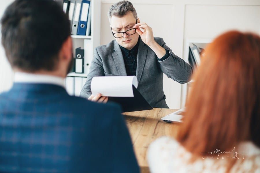 Young couple at consultation with a lawyer about Prenuptial Agreement