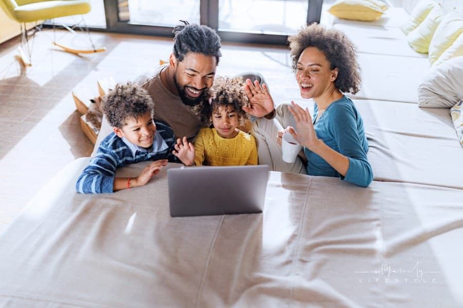 Family Video Calling on Laptop in the Living Room