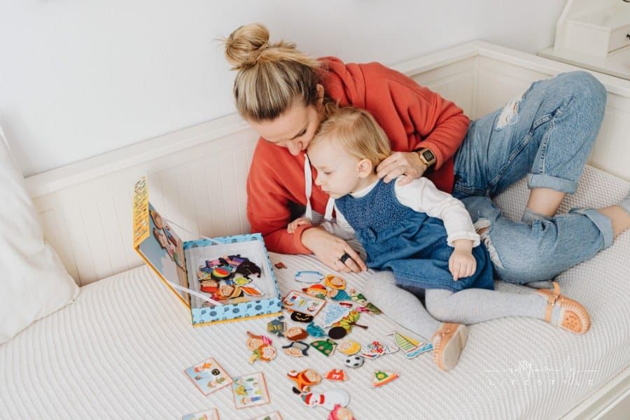 Mother and daughter putting together a puzzle
