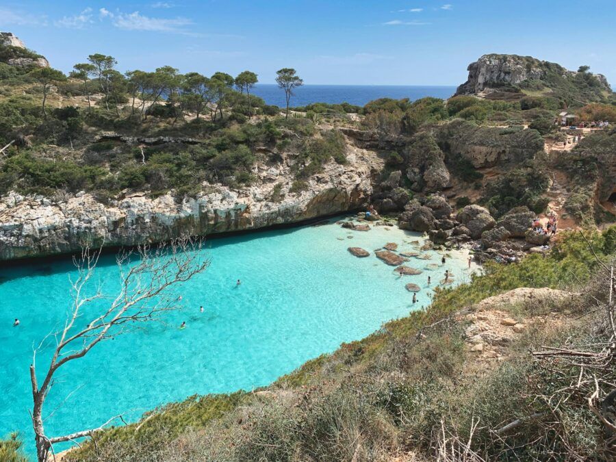 Discover the stunning azure waters and rocky coastline of Sant Antoni de Portmany, Ibiza.