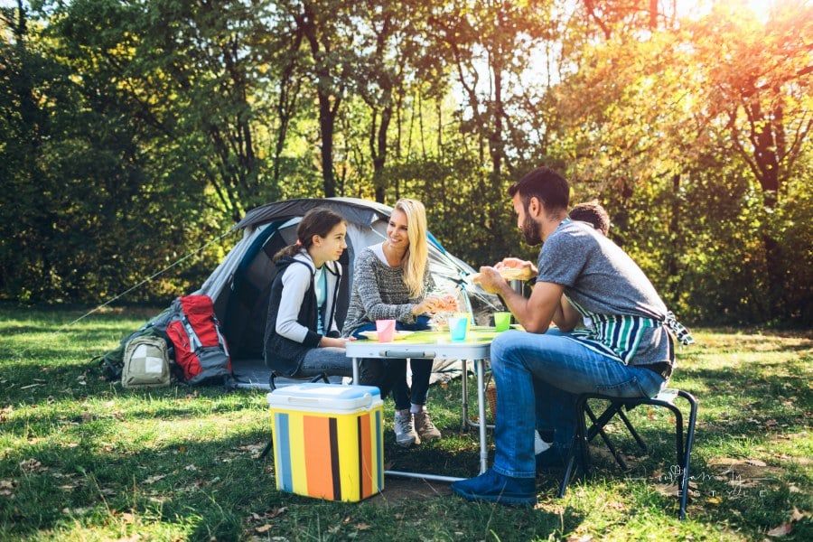Family tent camping together
