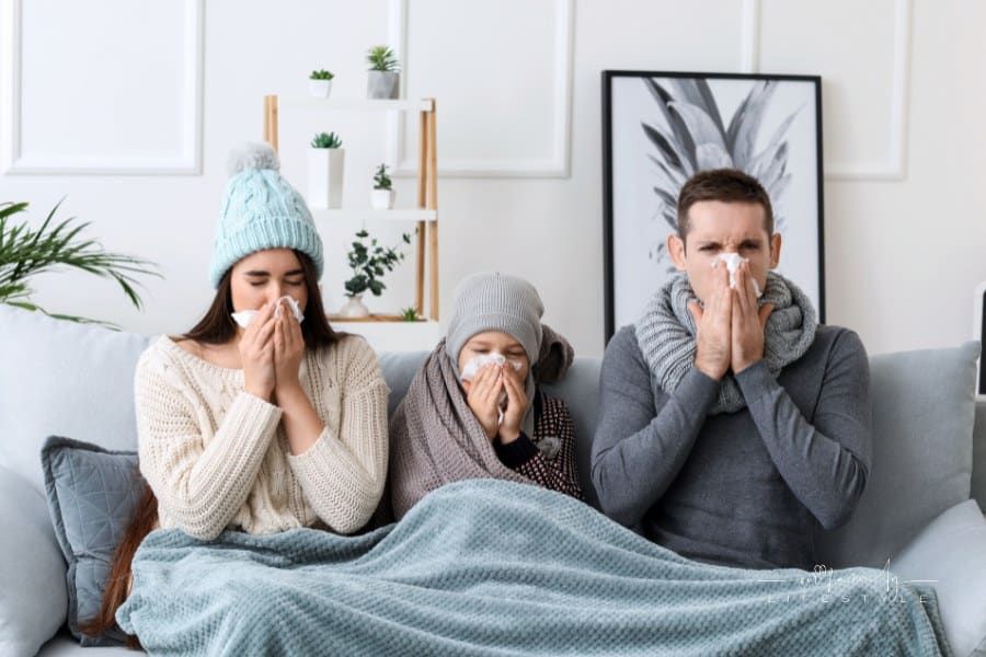 mom, dad, and son home on the cough with the flu