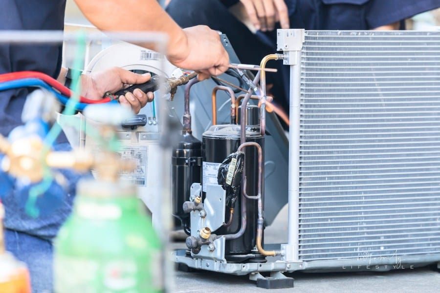 Close up of Air Conditioning Repair Team Use Fuel Gases