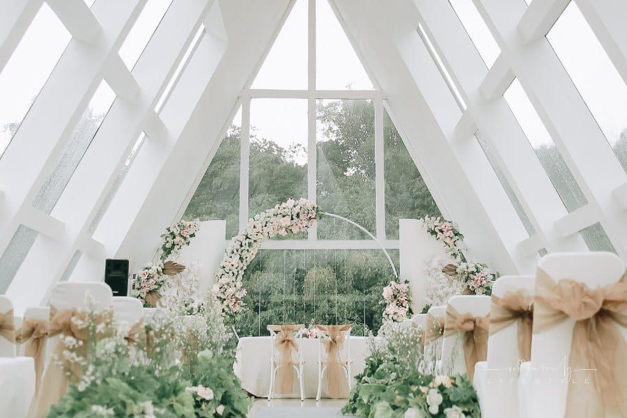 Decorated Aisle For Wedding Ceremony with High Ceiling