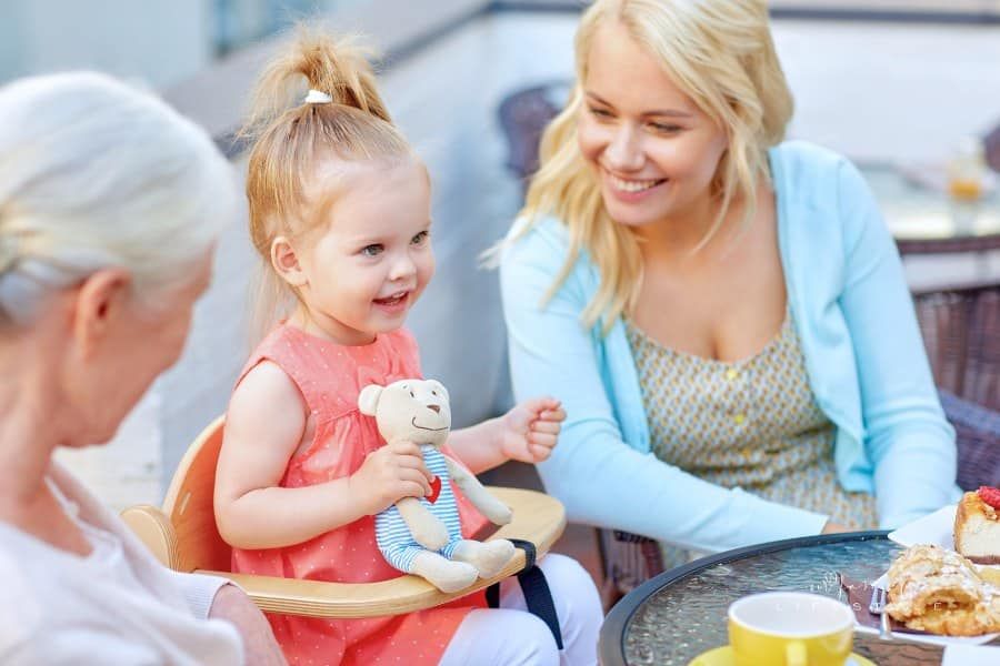 Mother, Daughter and Grandmother at Outdoor Cafe
