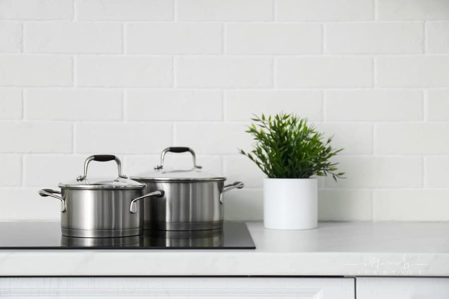 New Saucepots on Induction Stove in Kitchen
