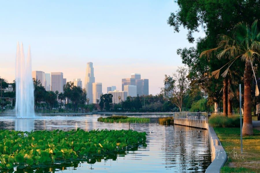Los Angeles downtown view from park with urban architectures and fountain.