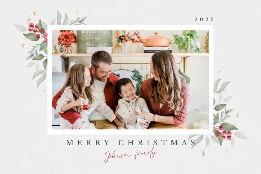 Family taking Christmas photos in kitchen for personalized Christmas cards