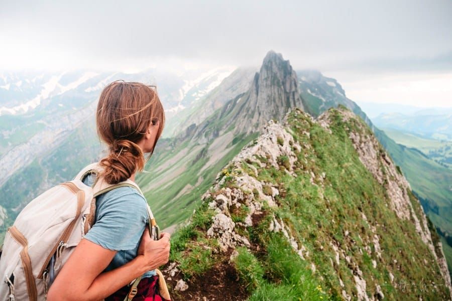 young woman hiking in Switzerland