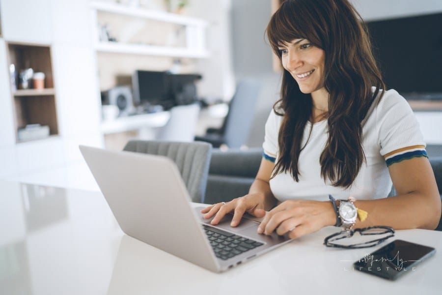 Woman working at home on laptop